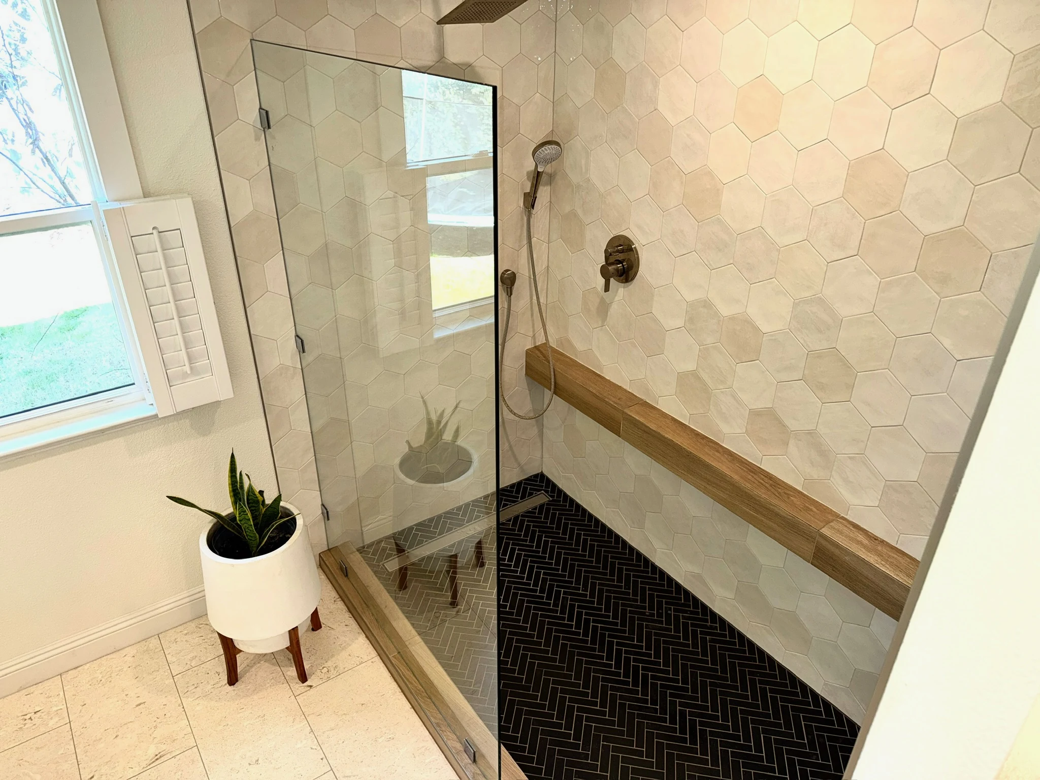 Custom hex tile shower with herringbone floor