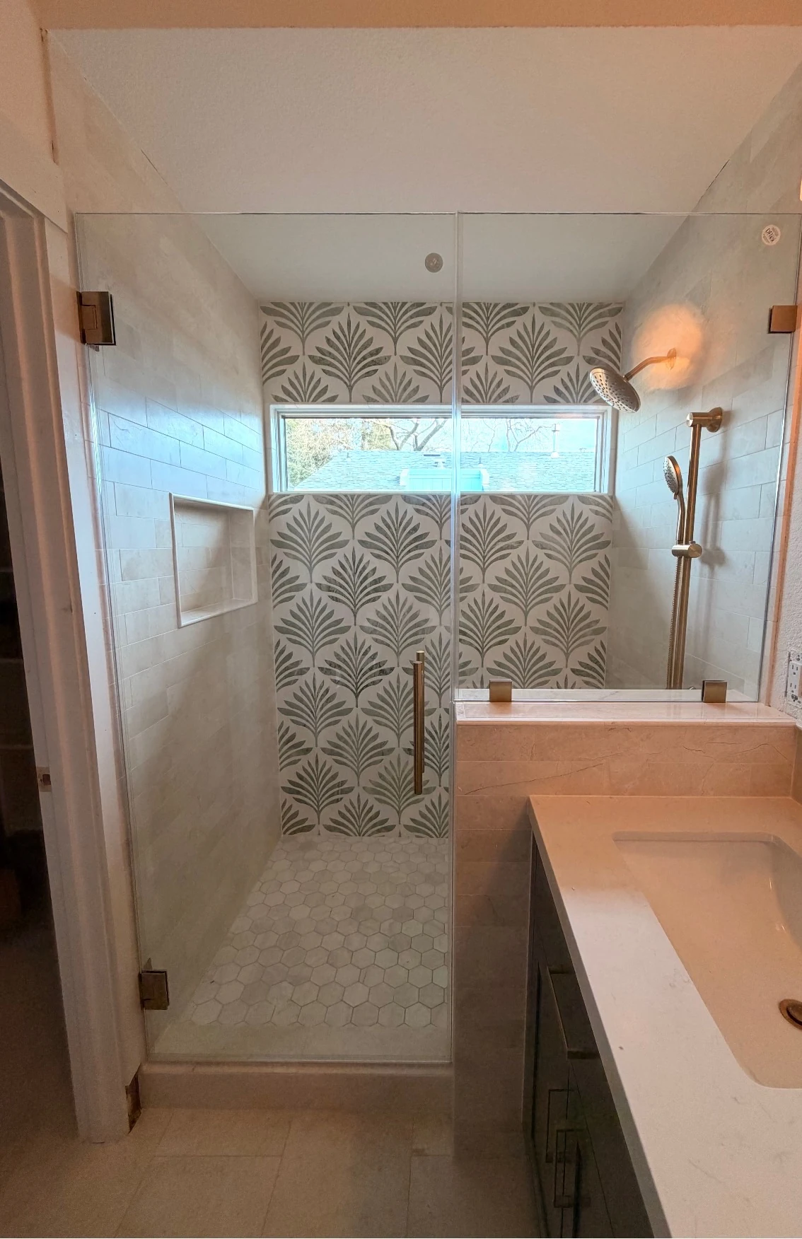 Custom shower with patterned feature wall